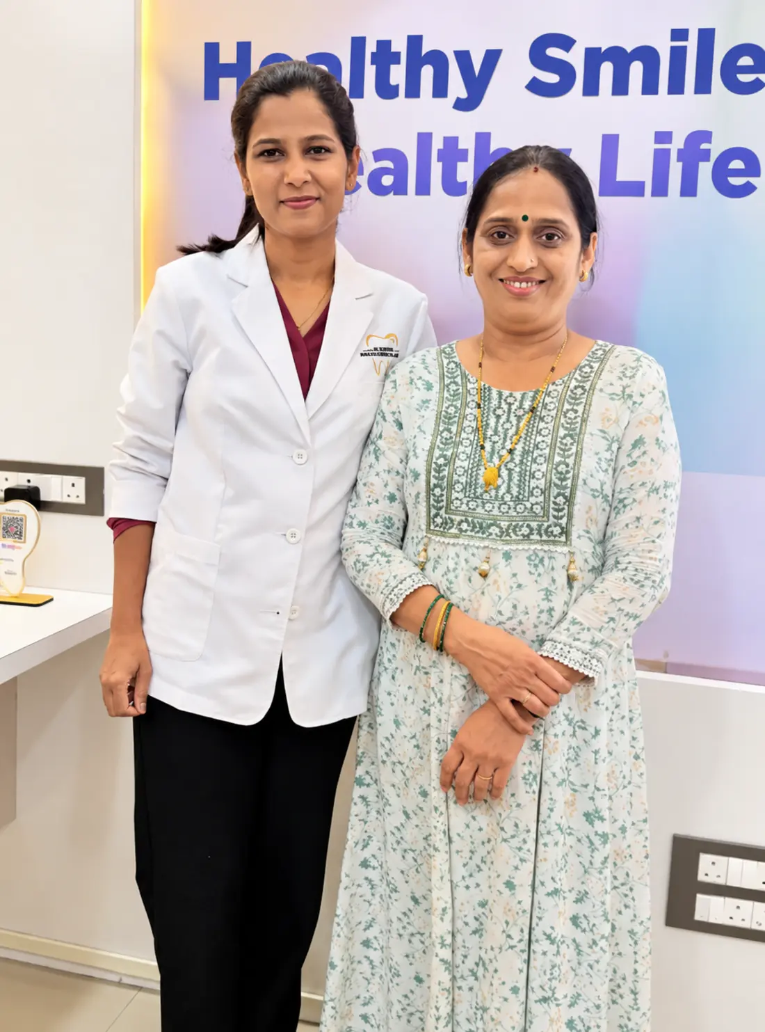Dr. Supriya Holkar with a patient at the clinic reception