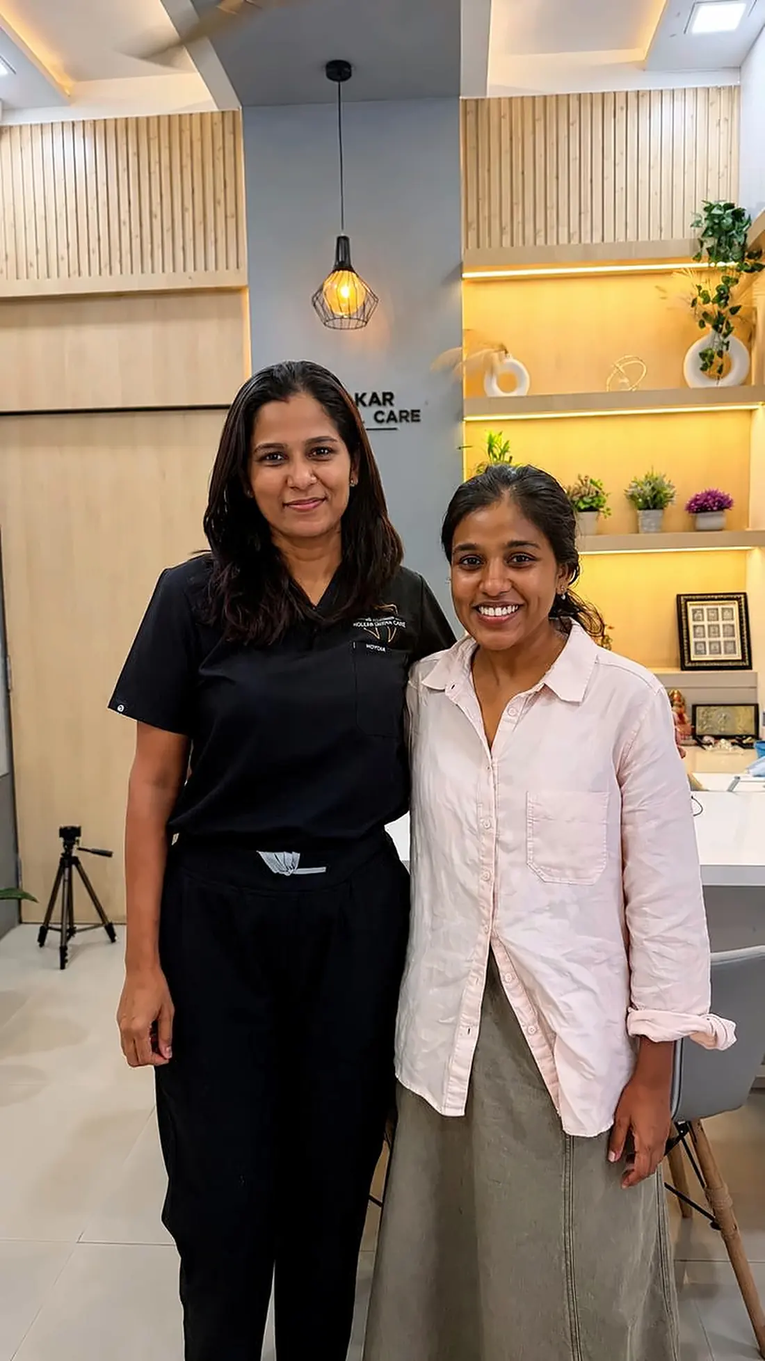 Dr. Supriya Holkar with a patient in the clinic waiting area