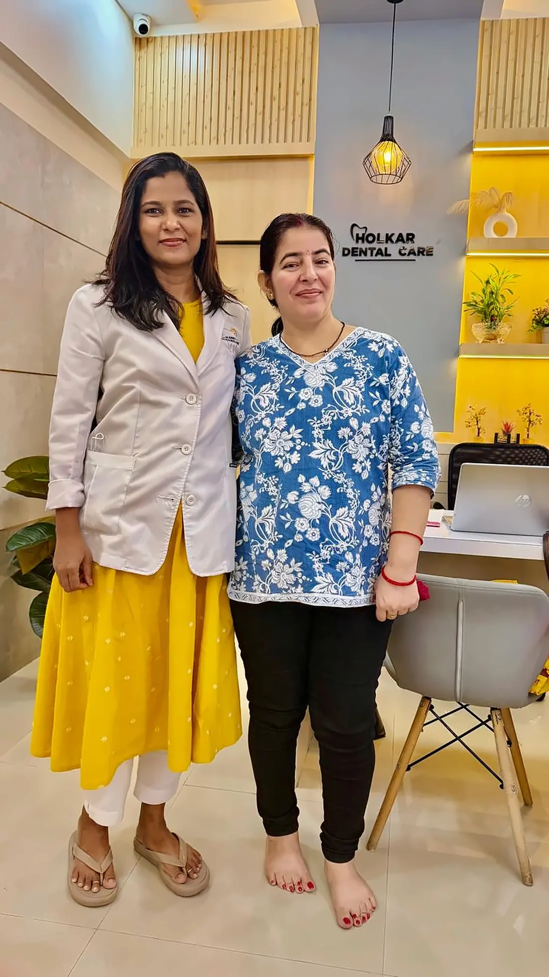Dr. Supriya Holkar with a patient at the clinic reception