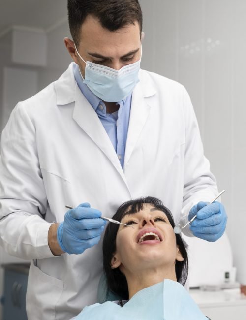 dentist-doing-check-up-patient